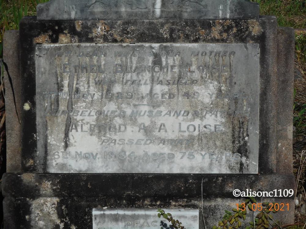 A weathered headstone plaque at Rookwood Cemetery, inscribed to Ethel Blanche Loise, who fell asleep 17 November 1929, and her husband Alfred A. A. Loise, who passed away 6 November 1954.